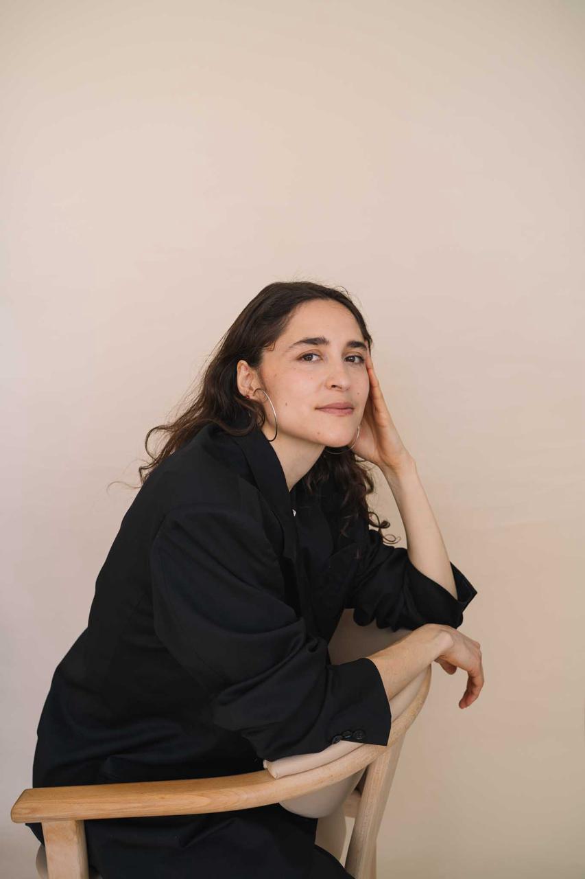 Alena Margarita Kroker in a black suit